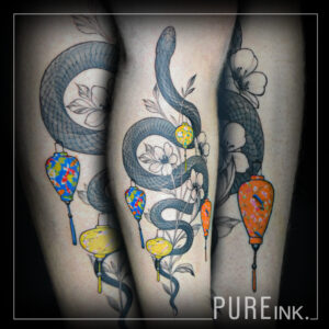 gray shade tattoo snake with flower