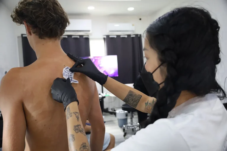 PUREink. artist preparing a tattoo stencil in Bangkok